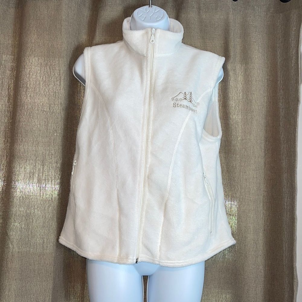 NWOT. TIPSY. White, zipper vest with front zipper pockets. LARGE.